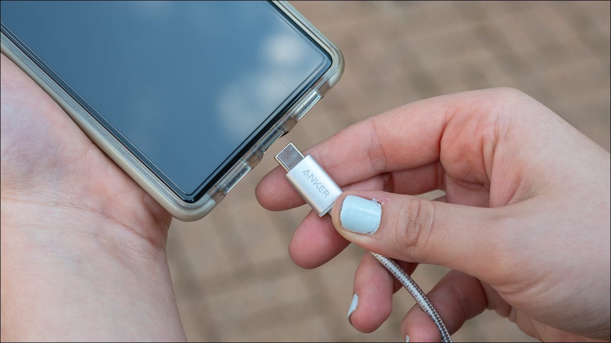 Person-plugging-the-Anker-New-Nylon-USB-C-cable-into-a-phone