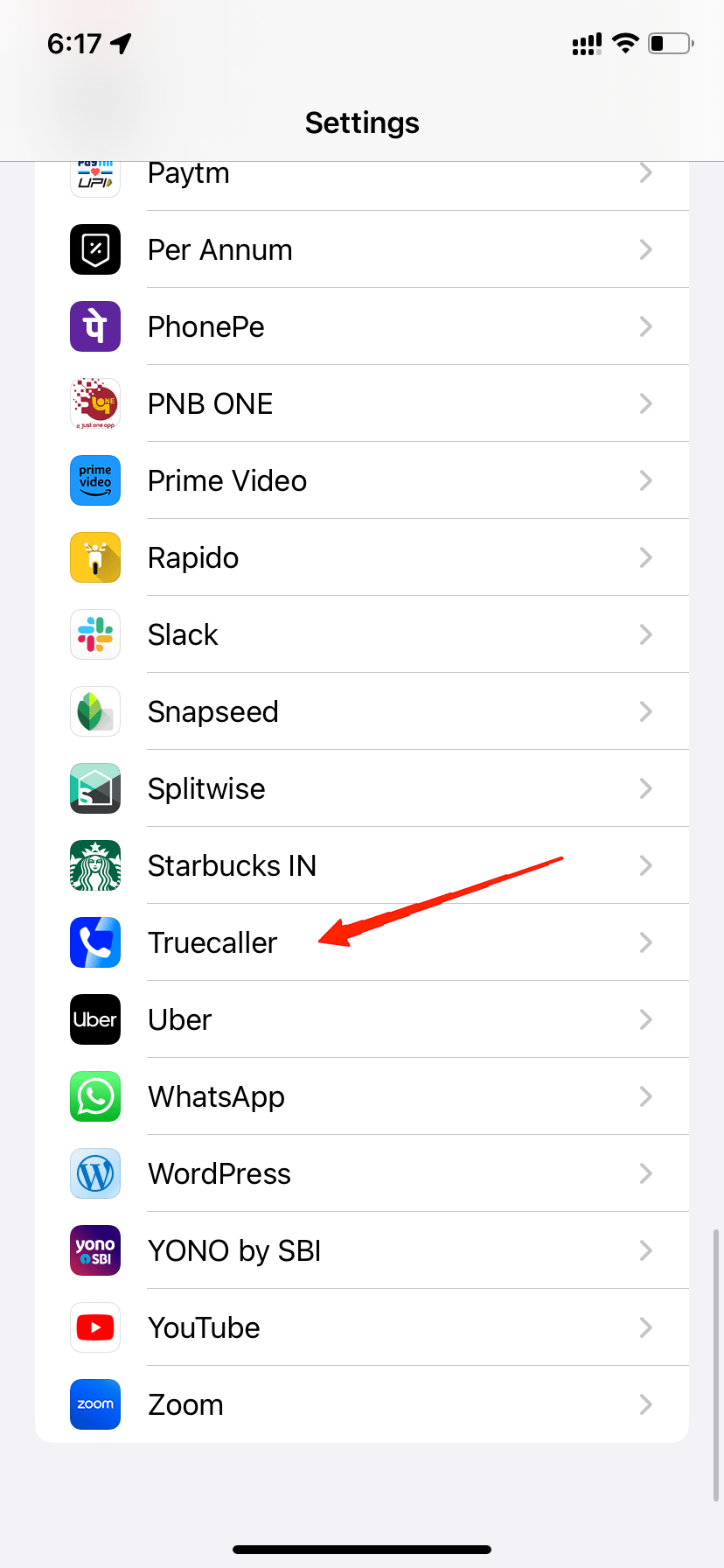 Open-the-settings-app-on-your-iPhone-and-navigate-to-the-Truecaller-option